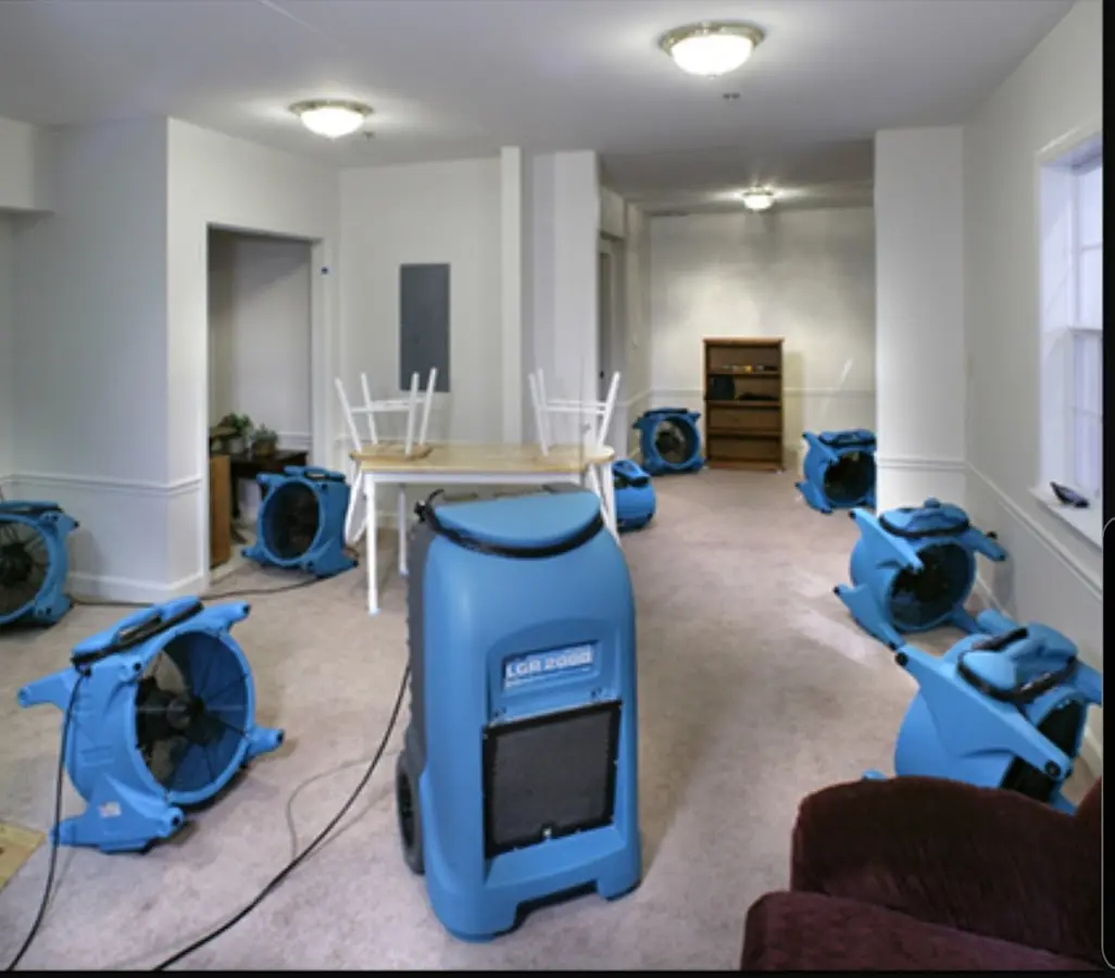 Air movers and dehumidifier setup for Water Damage Restoration in Macon
